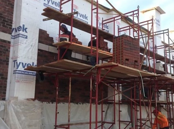 Linked image of Hotshots brick and block installation with scaffolding